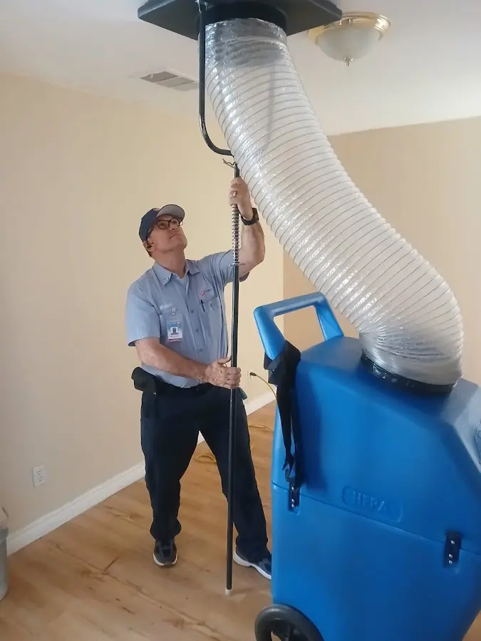 HVAC Installation technician using HEPA equipment in Olympia Heights